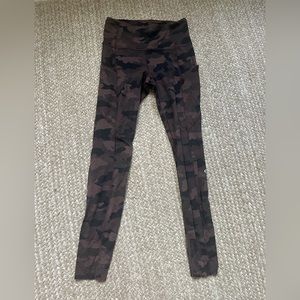Lightly worn Lululemon Wunder Under 28” maroon and black camo leggings.